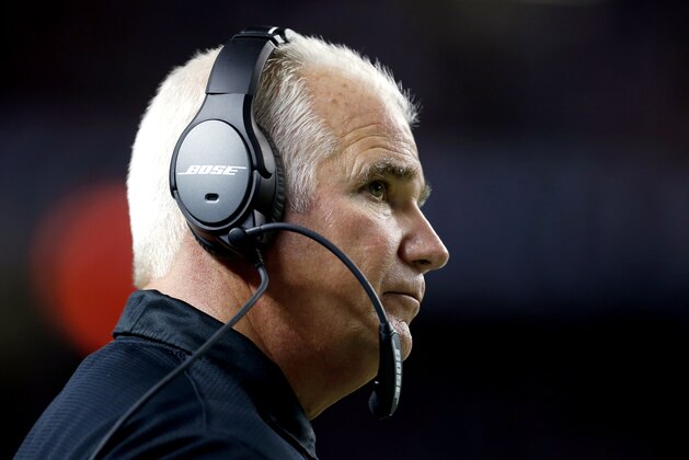 Atlanta Falcons head coach Mike Smith watches his team play against the Carolina Panthers during an NFL football game on Sunday, Dec. 28, 2014 in Atlanta. Smith was fired the next day after this game. The Panthers won the game 34-3. (Jeff Haynes/AP Images for Panini) Atlanta Falcons head coach Mike Smith watches his team play against the Carolina Panthers during an NFL football game on Sunday, Dec. 28, 2014 in Atlanta. Smith was fired the next day after this game. The Panthers won the game 34-3. (Jeff Haynes/AP Images for Panini)