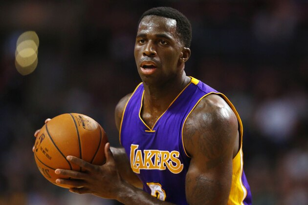 Los Angeles Lakers' Brandon Bass during the second half of the Los Angeles Lakers 112-104 win over the Boston Celtics in an NBA basketball game in Boston Wednesday, Dec. 30, 2015.(AP Photo/Winslow Townson)