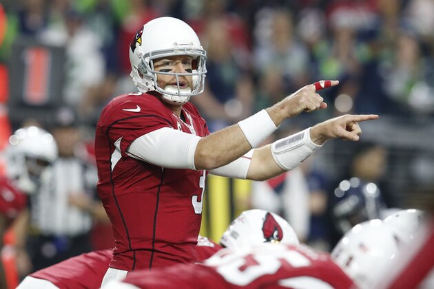 Arizona Cardinals quarterback Carson Palmer (3) calls a play against the Seattle Seahawks during the first half of an NFL football game, Sunday, Jan. 3, 2016, in Glendale, Ariz. (AP Photo/Rick Scuteri)