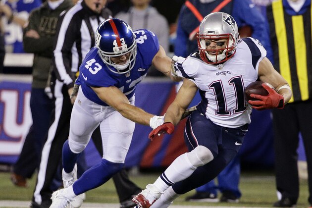 New York Giants' Craig Dahl (43) tackles New England Patriots' Julian Edelman (11) during the first half of an NFL football game Sunday, Nov. 15, 2015, in East Rutherford, N.J. (AP Photo/Julie Jacobson)