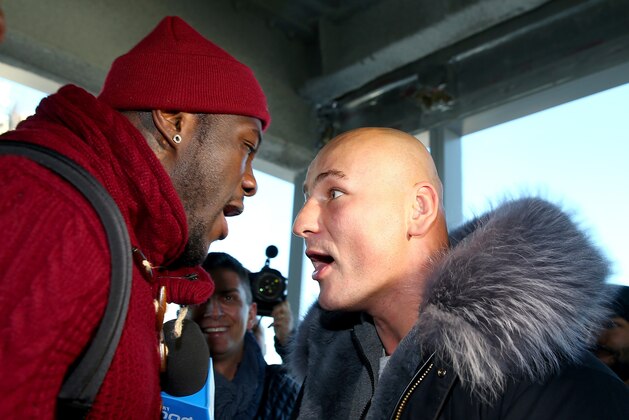 NEW YORK, NY - JANUARY 13:  Deontay Wilder and Artur Szpilka exchange words during a portrait and media availability on the terrace at Four World Trade Center on January 13, 2016 in New York City.  (Photo by Elsa/Getty Images)