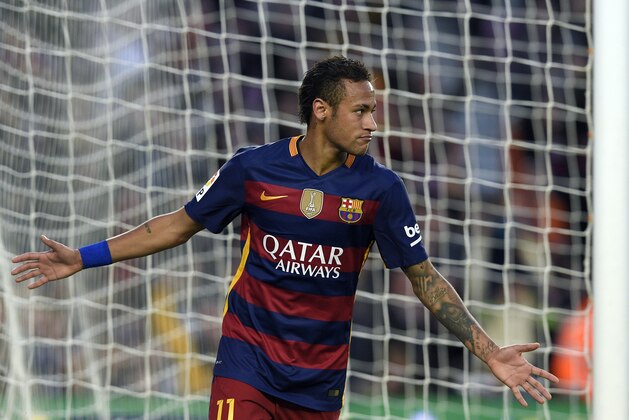 Barcelona's Brazilian forward Neymar celebrates a goal during the Spanish league football match FC Barcelona vs Granada CF at the Camp Nou stadium in Barcelona on January 9, 2016. AFP PHOTO / LLUIS GENE / AFP / LLUIS GENE        (Photo credit should read LLUIS GENE/AFP/Getty Images)
