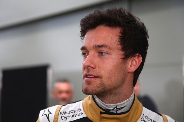 MELBOURNE, AUSTRALIA - MARCH 12: Jolyon Palmer of Great Britain and Lotus is seen in the pit paddock during previews to the Australian Formula One Grand Prix at Albert Park on March 12, 2015 in Melbourne, Australia.  (Photo by Robert Cianflone/Getty Images)