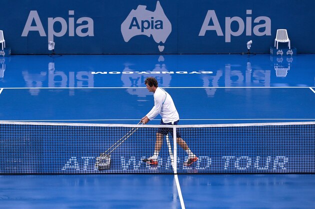 SYDNEY, AUSTRALIA - JANUARY 14:  A court is dried during a rain delay during day five of the 2016 Sydney International at Sydney Olympic Park Tennis Centre on January 14, 2016 in Sydney, Australia.  (Photo by Mark Metcalfe/Getty Images)