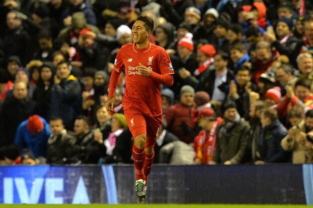 Liverpool's Brazilian midfielder Roberto Firmino celebrates after scoring during the English Premier League football match between Liverpool and Arsenal at Anfield stadium in Liverpool, north-west England on January 13, 2016.
AFP PHOTO / PAUL ELLIS
RESTRICTED TO EDITORIAL USE. NO USE WITH UNAUTHORIZED AUDIO, VIDEO, DATA, FIXTURE LISTS, CLUB/LEAGUE LOGOS OR 'LIVE' SERVICES. ONLINE IN-MATCH USE LIMITED TO 75 IMAGES, NO VIDEO EMULATION. NO USE IN BETTING, GAMES OR SINGLE CLUB/LEAGUE/PLAYER PUBLICATIONS. / AFP / PAUL ELLIS        (Photo credit should read PAUL ELLIS/AFP/Getty Images)