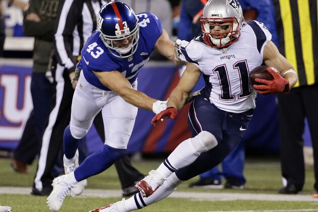 New York Giants' Craig Dahl (43) tackles New England Patriots' Julian Edelman (11) during the first half of an NFL football game Sunday, Nov. 15, 2015, in East Rutherford, N.J. (AP Photo/Julie Jacobson)