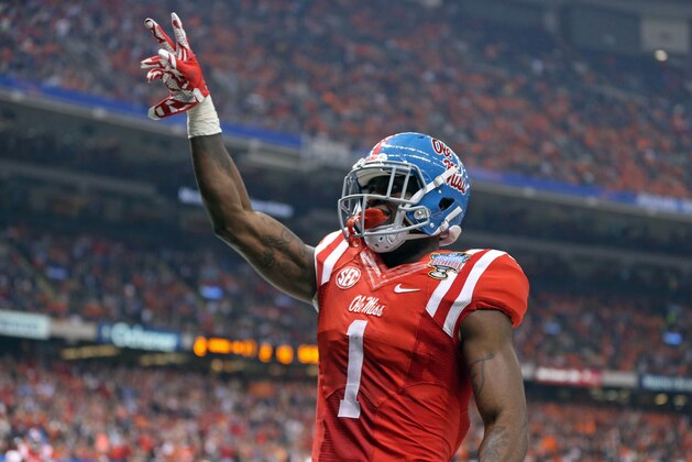 Jan 1, 2016; New Orleans, LA, USA; Mississippi Rebels wide receiver Laquon Treadwell (1) celebrates his ten-yard touchdown catch against the Oklahoma State Cowboys in the second quarter of the 2016 Sugar Bowl at the Mercedes-Benz Superdome. Mandatory Credit: Chuck Cook-USA TODAY Sports