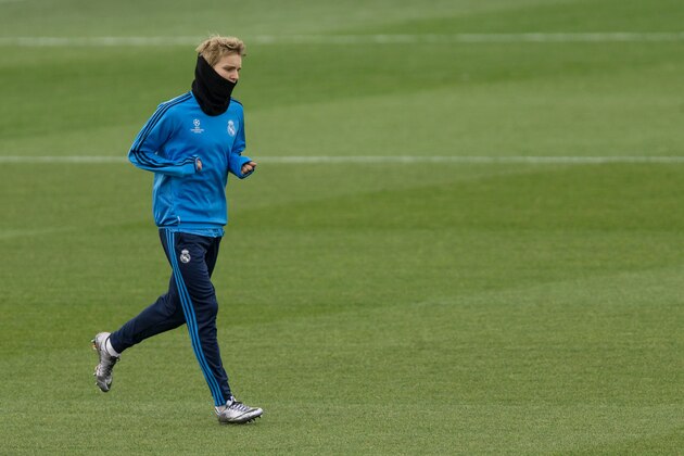 Real Madrid's B player Martin Odegaard from Norway runs during a training session in Valdebebas stadium in Madrid, Spain, Monday, Dec. 7, 2015. Real Madrid will face Malmo FF in a Champion's League Group A soccer match on Tuesday.(AP Photo/Daniel Ochoa de Olza)