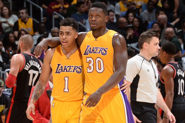 LOS ANGELES, CA - NOVEMBER 20:  Julius Randle #30 of the Los Angeles Lakers and D'Angelo Russell #1 of the Los Angeles Lakers talk during the game against the Toronto Raptors on November 20, 2015 at STAPLES Center in Los Angeles, California. NOTE TO USER: User expressly acknowledges and agrees that, by downloading and/or using this Photograph, user is consenting to the terms and conditions of the Getty Images License Agreement. Mandatory Copyright Notice: Copyright 2015 NBAE (Photo by Andrew D. Bernstein/NBAE via Getty Images)