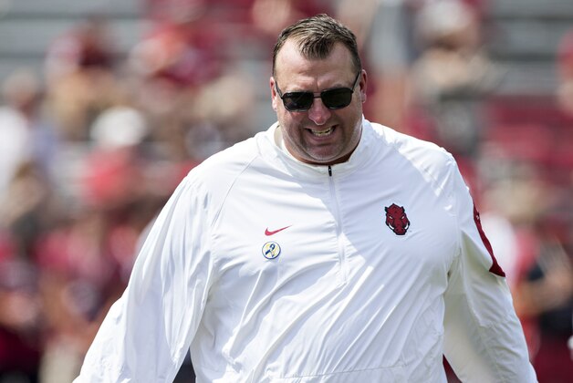 FAYETTEVILLE, AR - SEPTEMBER 5:  Head Coach Bret Bielema of the Arkansas Razorbacks watches his team warm up before a game against the UTEP Miners at Razorback Stadium on September 5, 2015 in Fayetteville, Arkansas.  The Razorbacks defeated the Miners 48-13.  (Photo by Wesley Hitt/Getty Images)