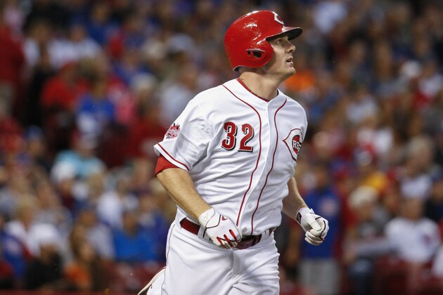 Cincinnati Reds' Jay Bruce watches the ball after hitting an RBI sacrifice fly off Chicago Cubs starting pitcher Jon Lester (34) in the first inning of a baseball game, Wednesday, Sept. 30, 2015, in Cincinnati. The Cubs won 10-3. (AP Photo/John Minchillo) Cincinnati Reds' Jay Bruce watches the ball after hitting an RBI sacrifice fly off Chicago Cubs starting pitcher Jon Lester (34) in the first inning of a baseball game, Wednesday, Sept. 30, 2015, in Cincinnati. The Cubs won 10-3. (AP Photo/John Minchillo)