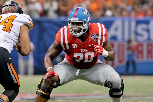 Jan 1, 2016; New Orleans, LA, USA; Mississippi Rebels offensive lineman Laremy Tunsil (78) blocks Oklahoma State Cowboys defensive end Jordan Brailford (94) during the second quarter in the 2016 Sugar Bowl at the Mercedes-Benz Superdome. Mandatory Credit: Derick E. Hingle-USA TODAY Sports