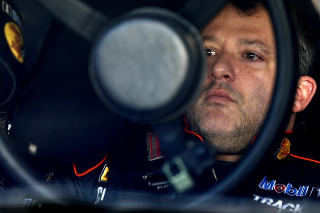 MARTINSVILLE, VA - OCTOBER 30:  Tony Stewart, driver of the #14 Bass Pro Shops/Mobil 1 Chevrolet, sits in his car in the garage area during practice for the NASCAR Sprint Cup Series Goody's Headache Relief Shot 500 at Martinsville Speedway on October 30, 2015 in Martinsville, Virginia.  (Photo by Jeff Zelevansky/Getty Images)