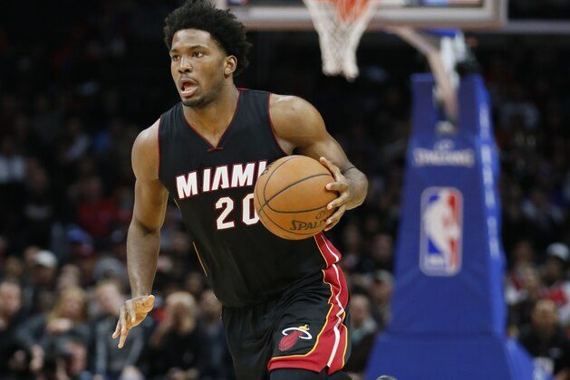 Miami Heat's Justise Winslow dribbles against the Los Angeles Clippers during the second half of an NBA basketball game, Wednesday, Jan. 13, 2016, in Los Angeles. The Clippers won 104-90. (AP Photo/Danny Moloshok)