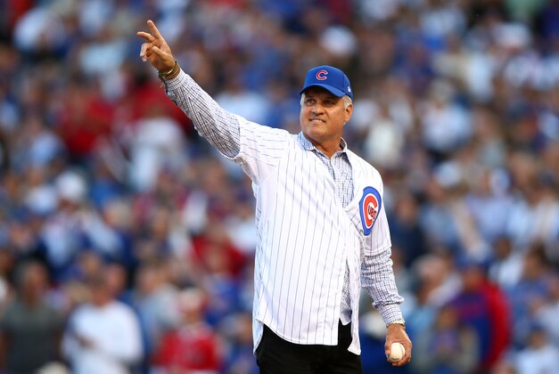 Oct 12, 2015; Chicago, IL, USA; Chicago Cubs hall of fame infielder Ryne Sandberg throws out the ceremonial first pitch before game three of the NLDS between the Chicago Cubs and the St. Louis Cardinals at Wrigley Field. Mandatory Credit: Jerry Lai-USA TODAY Sports