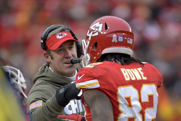 Kansas City Chiefs wide receiver Dwayne Bowe (82) is congratulated by Offensive Coordinator Doug Pederson after a touchdown during the second half of an NFL football game in Kansas City, Mo., Sunday, Nov. 24, 2013. (AP Photo/Reed Hoffmann)
