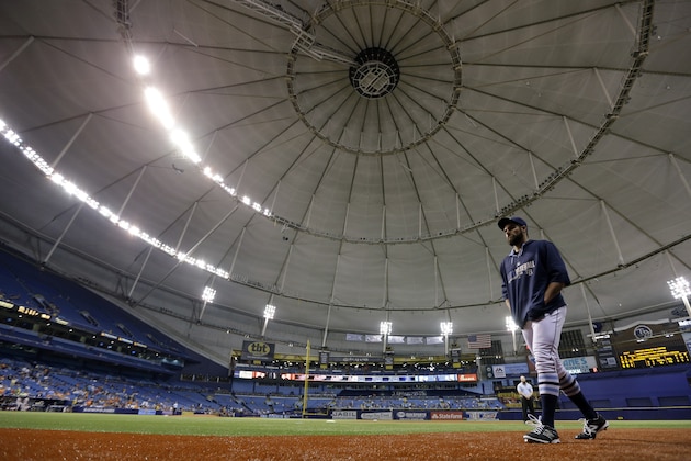 Tampa Bay Rays relief pitcher Josh Lueke walks to the dugout after some of the power went out at Tropicana Field during the eighth inning of a baseball game against the Baltimore Orioles, Tuesday, May 6, 2014, in St. Petersburg, Fla. (AP Photo/Chris O'Meara)