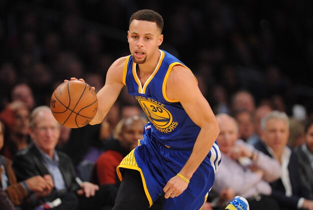 January 5, 2016; Los Angeles, CA, USA; Golden State Warriors guard Stephen Curry (30) moves the ball up court against Los Angeles Lakers during the first half at Staples Center. Mandatory Credit: Gary A. Vasquez-USA TODAY Sports