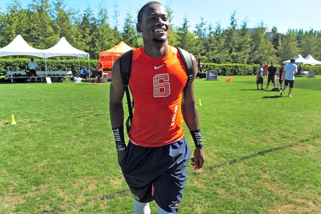 Jul 9, 2014; Beaverton, OR, USA; Alpha Pro athlete Torrance Gibson (6) walks off the field during Nike Football ' The Opening' at Nike World Headquarters. Mandatory Credit: Steve Dykes-USA TODAY Sports