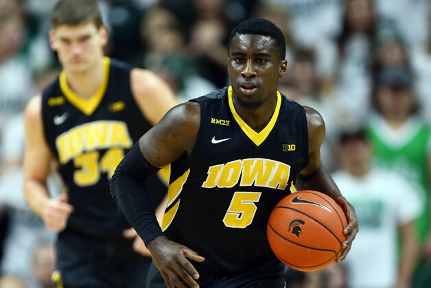 Jan 14, 2016; East Lansing, MI, USA; Iowa Hawkeyes guard Anthony Clemmons (5) brings the ball up court during the first half of a game against the Michigan State Spartans  at Jack Breslin Student Events Center. Mandatory Credit: Mike Carter-USA TODAY Sports