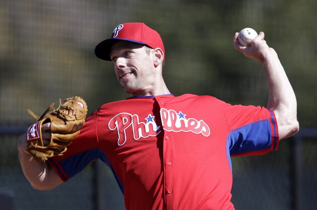 Philadelphia Phillies starting pitcher Cliff Lee throws during a spring training baseball workout, Thursday, Feb. 19, 2015, in Clearwater, Fla. (AP Photo/Lynne Sladky)