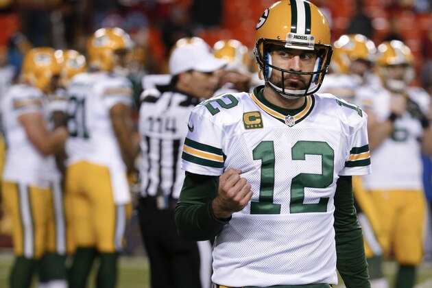 Green Bay Packers quarterback Aaron Rodgers pumps his fist as he walks off the field in the closing minutes of the team's NFL wild-card playoff football game against the Washington Redskins in Landover, Md., Sunday, Jan. 10, 2016. The Packers won 35-18. (AP Photo/Alex Brandon) Green Bay Packers quarterback Aaron Rodgers pumps his fist as he walks off the field in the closing minutes of the team's NFL wild-card playoff football game against the Washington Redskins in Landover, Md., Sunday, Jan. 10, 2016. The Packers won 35-18. (AP Photo/Alex Brandon)