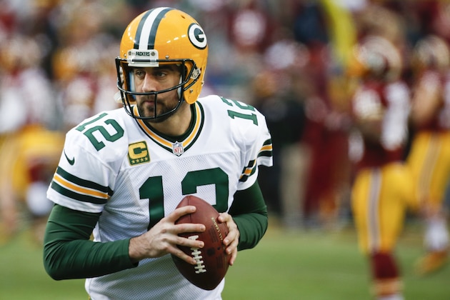 Green Bay Packers quarterback Aaron Rodgers (12) warms up before an NFL wild card playoff football game against the Washington Redskins in Landover, Md., Sunday, Jan. 10, 2016. (AP Photo/Alex Brandon)