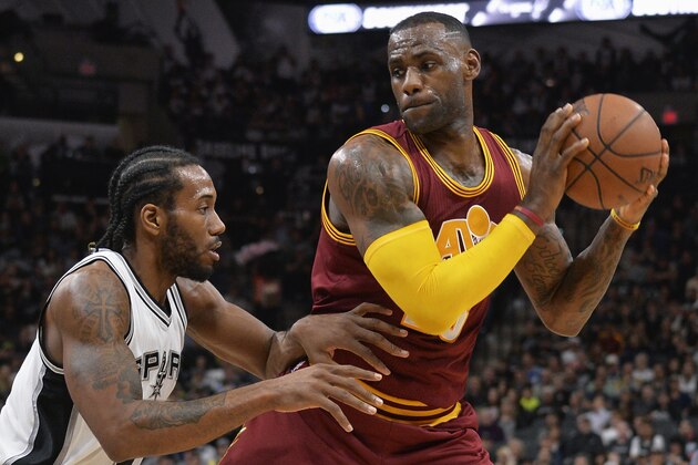 Cleveland Cavaliers forward LeBron James, right, prepares to drive around San Antonio Spurs forward Kawhi Leonard during the first half of an NBA basketball game Thursday, Jan. 14, 2016, in San Antonio. (AP Photo/Darren Abate) Cleveland Cavaliers forward LeBron James, right, prepares to drive around San Antonio Spurs forward Kawhi Leonard during the first half of an NBA basketball game Thursday, Jan. 14, 2016, in San Antonio. (AP Photo/Darren Abate)