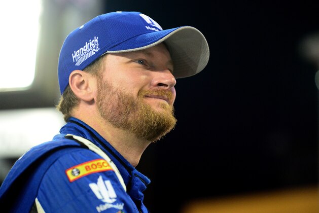HOMESTEAD, FL - NOVEMBER 20:  Dale Earnhardt Jr., driver of the #88 Nationwide Chevrolet, stands on the grid during qualifying for the NASCAR Sprint Cup Series Ford EcoBoost 400 at Homestead-Miami Speedway on November 20, 2015 in Homestead, Florida.  (Photo by Jeff Curry/Getty Images)