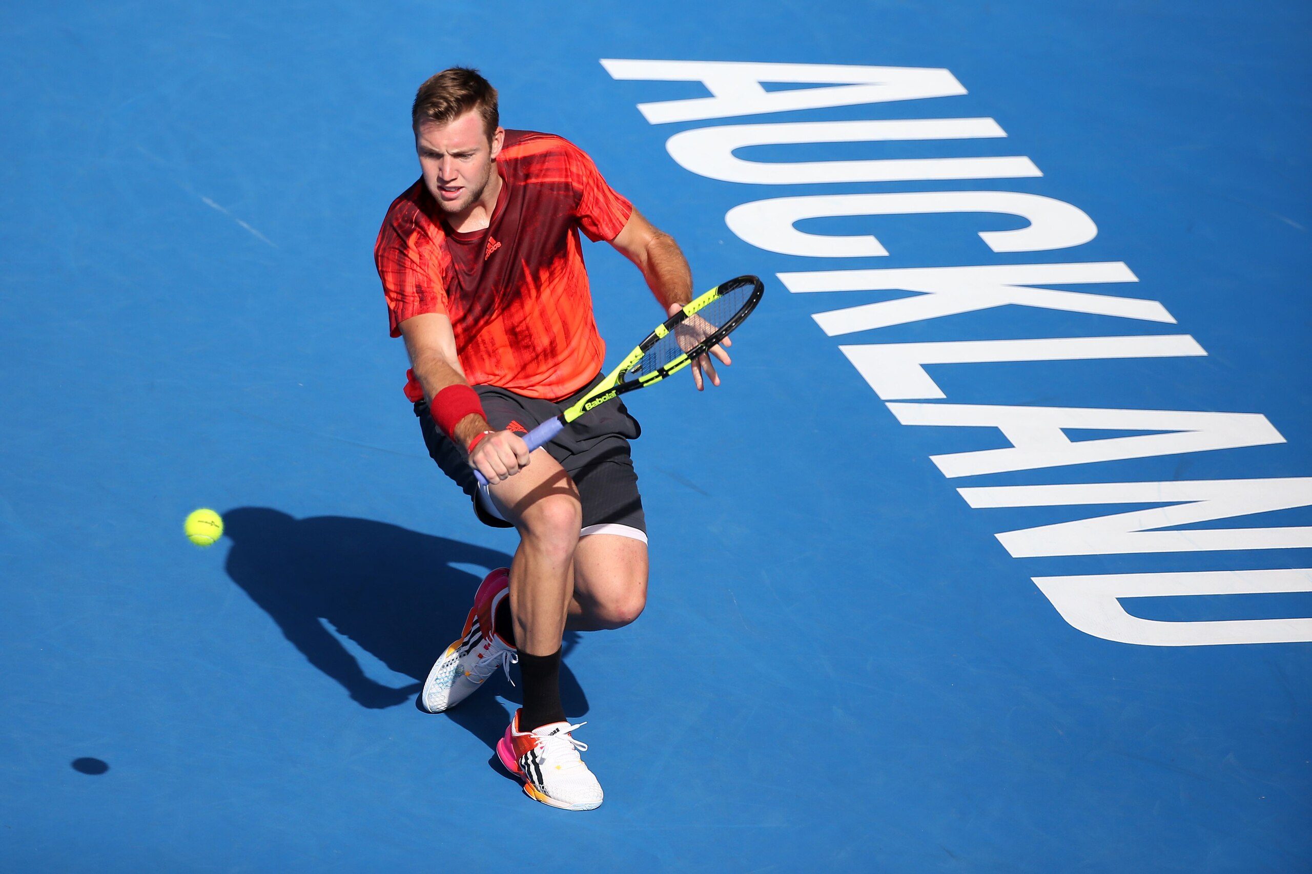 Jack Sock of the US hits a return against David Ferrer of Spain during their men's singles semi-final match at the ATP Auckland Classic tennis tournament in Auckland on January 15, 2016. AFP PHOTO / Fiona Goodall / AFP / Fiona GOODALL        (Photo credit should read FIONA GOODALL/AFP/Getty Images)