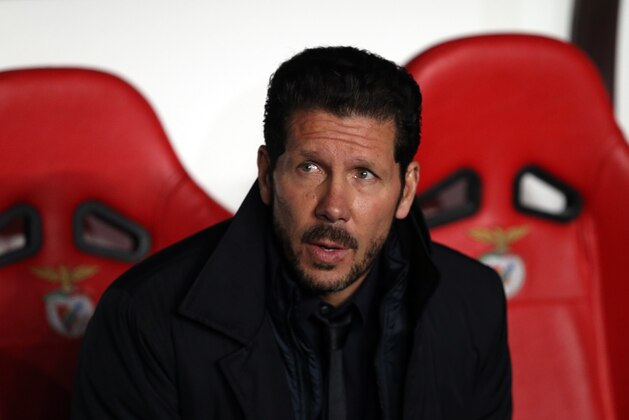 Atletico's coach Diego Simeone is seen before the Champions League group C soccer match between Benfica and Atletico Madrid at the Luz stadium in Lisbon, Tuesday, Dec. 8, 2015. (AP Photo/Armando Franca)