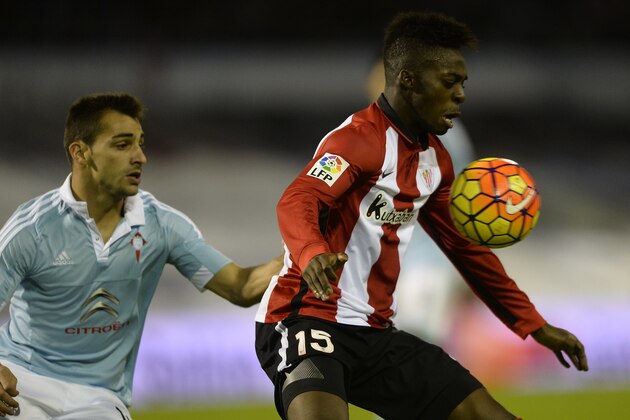 Athletic Bilbao's forward Inaki Williams (R) controls the ball next to Celta Vigo's defender Jonny Castro during the Spanish league football match RC Celta de Vigo vs Athletic Club Bilbao at the Balaidos stadium in Vigo on December 30, 2015.   AFP PHOTO/ MIGUEL RIOPA / AFP / MIGUEL RIOPA        (Photo credit should read MIGUEL RIOPA/AFP/Getty Images)