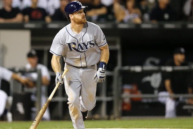 Tampa Bay Rays' Logan Forsythe watches his sacrifice fly off Chicago White Sox starting pitcher Jose Quintana, scoring Joey Butler, during the fifth inning of a baseball game Monday, Aug. 3, 2015, in Chicago. (AP Photo/Charles Rex Arbogast)