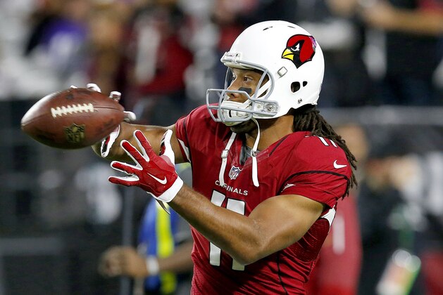 Arizona Cardinals wide receiver Larry Fitzgerald (11) warms up prior to an NFL football game against the Minnesota Vikings, Thursday, Dec. 10, 2015, in Glendale, Ariz. (AP Photo/Rick Scuteri)