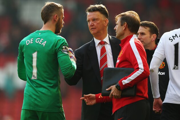 LIVERPOOL, ENGLAND - MARCH 22:  Louis van Gaal, manager of Manchester United celebrates victory with David De Gea of Manchester United after the Barclays Premier League match between Liverpool and Manchester United at Anfield on March 22, 2015 in Liverpool, England.  (Photo by Alex Livesey/Getty Images)
