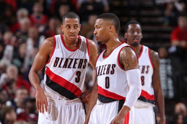 PORTLAND, OR - DECEMBER 14:  C.J. McCollum #3 and Damian Lillard #0 of the Portland Trail Blazers talk during the game against the New Orleans Pelicans on December 14, 2015 at the Moda Center Arena in Portland, Oregon. NOTE TO USER: User expressly acknowledges and agrees that, by downloading and or using this photograph, user is consenting to the terms and conditions of the Getty Images License Agreement. Mandatory Copyright Notice: Copyright 2015 NBAE (Photo by Sam Forencich/NBAE via Getty Images)