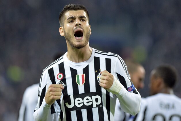 Juventus Alvaro Morata celebrates after he scored during the Champions League group D soccer match between Juventus and FC Sevilla, at the Juventus Stadium in Turin, Italy, Wednesday, Sept. 30, 2015. (AP Photo/Massimo Pinca)