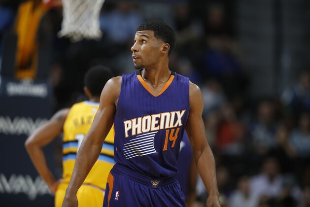 Phoenix Suns guard Ronnie Price (14) in the second half of an NBA basketball game Friday, Nov. 20, 2015, in Denver. Phoenix won 114-107. (AP Photo/David Zalubowski)