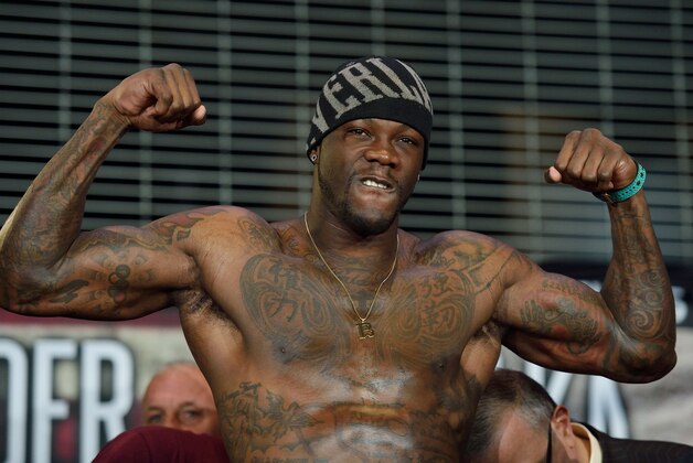 Boxer Deontay Wilder of the US flexes his muscles while weighing in at Barclay's Center January 15, 2016 in New York. Wilder is scheduled to fight Artur Szpilka of Poland for the WBC Heavyweight title January 16, 2016 in New York.
Wilder is scheduled to fight Artur Szpilka of Poland for the WBC Heavyweight title January 16, 2016 in New York. / AFP / DON EMMERT        (Photo credit should read DON EMMERT/AFP/Getty Images)