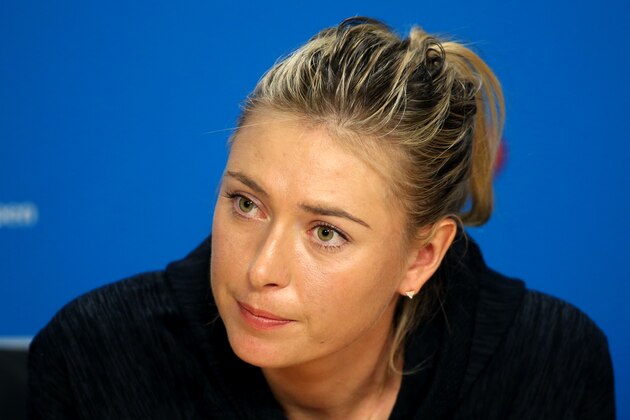 Russia's Maria Sharapova listens to reporter's question during a press conference, ahead of the Australian Open tennis championships in Melbourne, Australia, Saturday, Jan. 16, 2016.(AP Photo/Rick Rycroft)