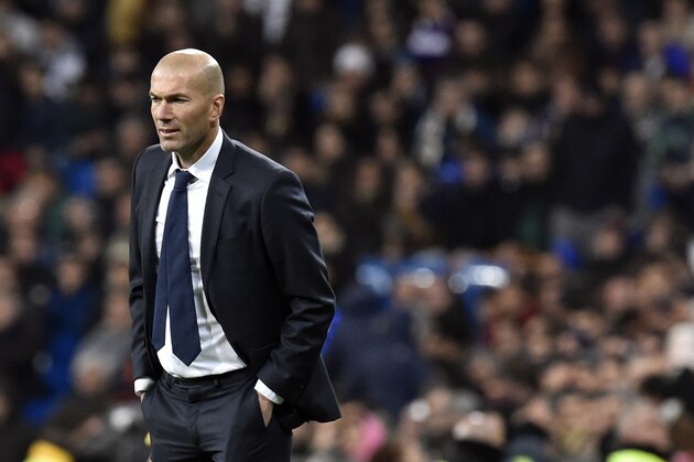 TOPSHOT - Real Madrid's French coach Zinedine Zidane looks at players during the Spanish league football match Real Madrid CF vs RC Deportivo La Coruna at the Santiago Bernabeu stadium in Madrid on January 9, 2016. AFP PHOTO / GERARD JULIEN / AFP / GERARD JULIEN (Photo credit should read GERARD JULIEN/AFP/Getty Images) TOPSHOT - Real Madrid's French coach Zinedine Zidane looks at players during the Spanish league football match Real Madrid CF vs RC Deportivo La Coruna at the Santiago Bernabeu stadium in Madrid on January 9, 2016. AFP PHOTO / GERARD JULIEN / AFP / GERARD JULIEN (Photo credit should read GERARD JULIEN/AFP/Getty Images)