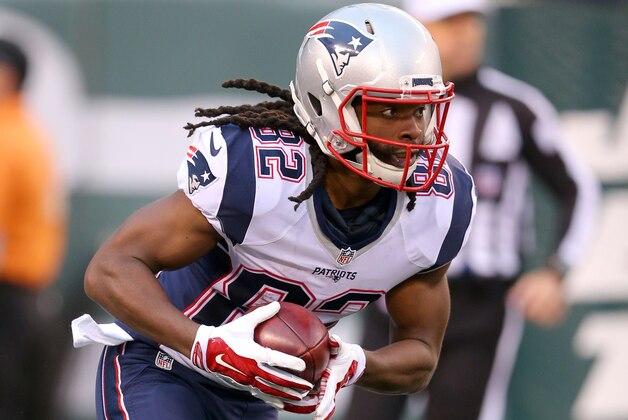 New England Patriots wide receiver Keshawn Martin (82) runs the ball against the New York Jets during an NFL game at MetLife Stadium in East Rutherford, N.J. on Sunday, Dec. 27, 2015. (AP Photo/Brad Penner)