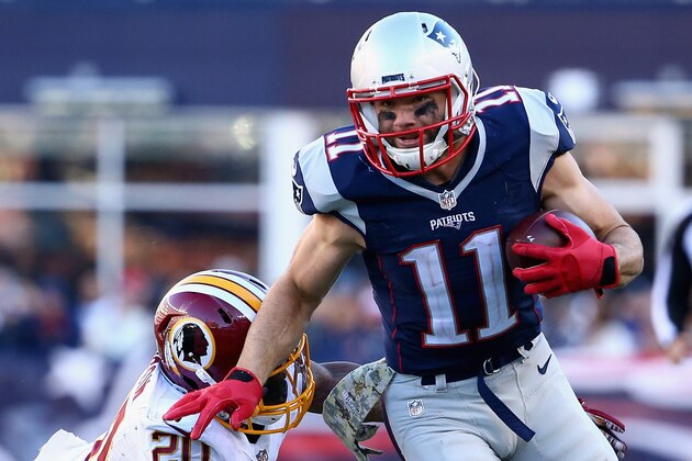 FOXBORO, MA - NOVEMBER 08:   Julian Edelman #11 of the New England Patriots carries the ball against the Washington Redskins at Gillette Stadium on November 8, 2015 in Foxboro, Massachusetts.  (Photo by Maddie Meyer/Getty Images)