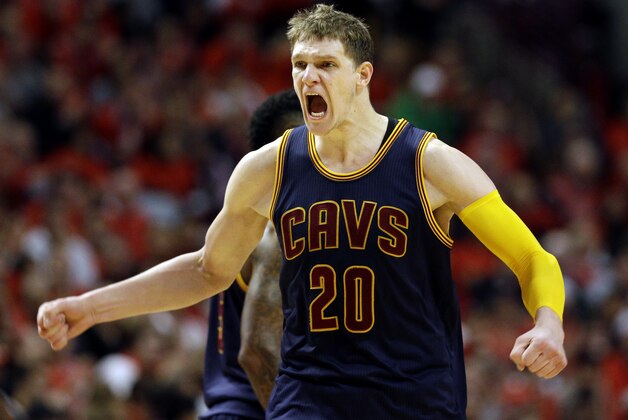 Cleveland Cavaliers center Timofey Mozgov reacts after scoring a basket during the second half of Game 4 in a second-round NBA basketball playoff series against the Chicago Bulls in Chicago on Sunday, May 10, 2015. The Cavaliers won 86-84. (AP Photo/Nam Y. Huh)