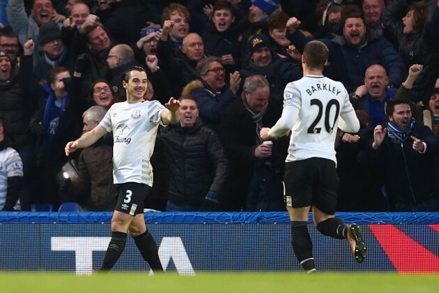 LONDON, ENGLAND - JANUARY 16: Leighton Baines (L) and Ross Barkley (R) of Everton celebrates their team's first goal scored by John Terry of Chelsea during the Barclays Premier League match between Chelsea and Everton at Stamford Bridge on January 16, 2016 in London, England.  (Photo by Clive Rose/Getty Images)