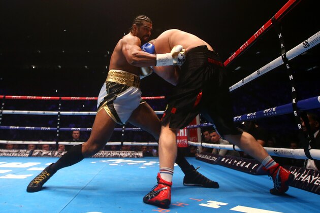 LONDON, ENGLAND - JANUARY 16: David Haye (L) of England in action with Mark De Mori (R) of Australia during their International heavyweight contest at The O2 Arena on January 16, 2016 in London, England. (Photo by Charlie Crowhurst/Getty Images)