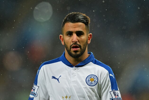 Leicester City's Algerian midfielder Riyad Mahrez reacts during the English Premier League football match between Aston Villa and Leicester City at Villa Park in Birmingham, central England on January 16, 2016.  AFP PHOTO / GLYN KIRK

RESTRICTED TO EDITORIAL USE. No use with unauthorized audio, video, data, fixture lists, club/league logos or 'live' services. Online in-match use limited to 75 images, no video emulation. No use in betting, games or single club/league/player publications. / AFP / GLYN KIRK        (Photo credit should read GLYN KIRK/AFP/Getty Images)