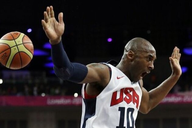 United States' Kobe Bryant reacts after a dunk during a men's gold medal basketball game against Spain at the 2012 Summer Olympics, Sunday, Aug. 12, 2012, in London. (AP Photo/Eric Gay)