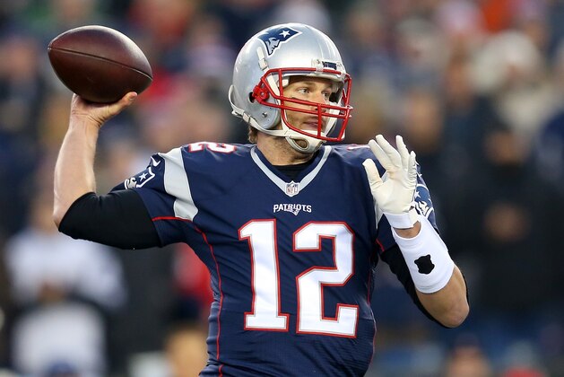 FOXBORO, MA - JANUARY 16:  Tom Brady #12 of the New England Patriots looks to pass in the first half against the Kansas City Chiefs during the AFC Divisional Playoff Game at Gillette Stadium on January 16, 2016 in Foxboro, Massachusetts.  (Photo by Jim Rogash/Getty Images)