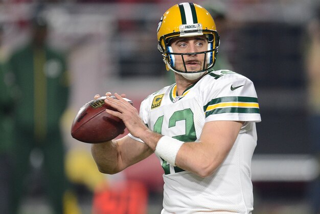 January 16, 2016; Glendale, AZ, USA; Green Bay Packers quarterback Aaron Rodgers (12) throws before playing against the Arizona Cardinals in the NFC Divisional round playoff game at University of Phoenix Stadium. Mandatory Credit: Joe Camporeale-USA TODAY Sports